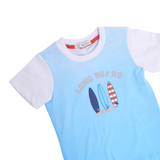 Conjunto  2 piezas de playera azul manga corta con estampado y pantalones de mezclilla